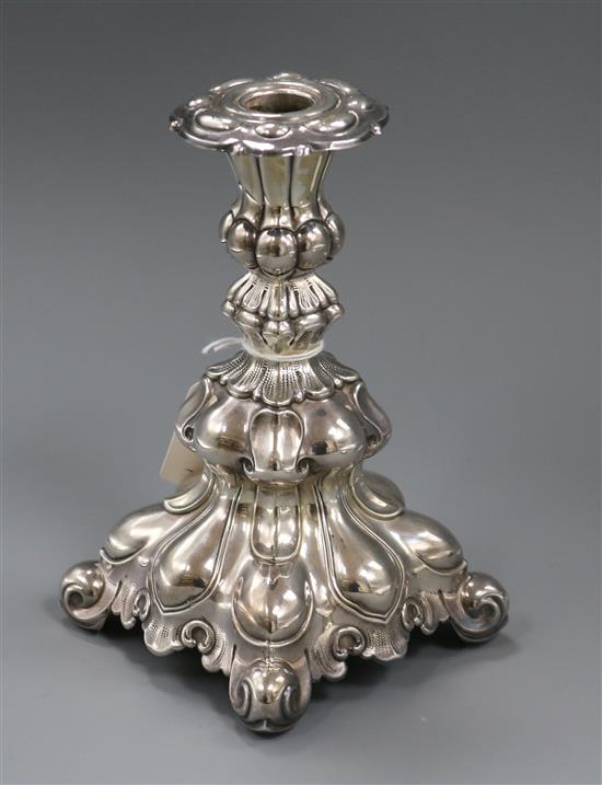 An ornate continental white metal candlestick, 18.3cm.